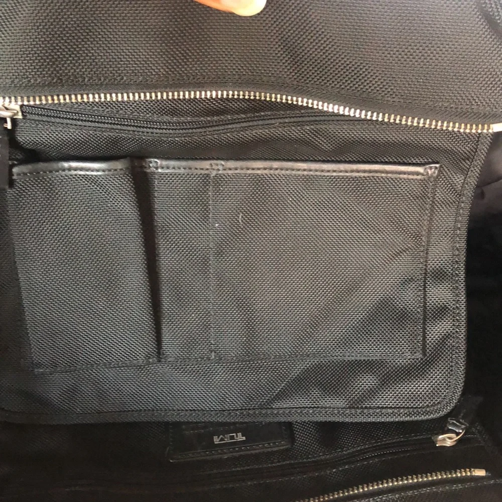 TUMI large black weekender bag. Leather and nylon. Detachable strap.
